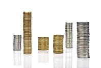 Stacks of coins isolated on white [IBR125382620]
