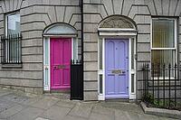 Dublin, Ireland. April 7, 2026. the brightly colored entrance doors to a building in the city center [IBR125382645]