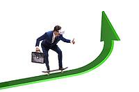 Businessman rides skateboard in financial chart [IBR125382654]