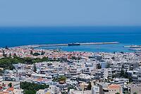 Panoramic view of the Greek city of Rethymno from a height on the island of Crete Greece. Residential buildings and the Aegean sea. [IBR125405004]