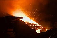 A stream of molten steel flowing from a blast furnace [IBR125405010]