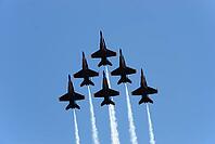 A formation of airplanes on a blue sky [IBR125405023]