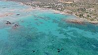 Stunning beach at Elafonisi with crystal clear turquoise sea water, famous Greek destination known for natural beauty, relaxation and summer tourism [IBR125405046]