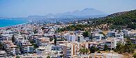 Panoramic view of the Greek city of Rethymno from a height on the island of Crete Greece. Residential buildings and the Aegean sea. [IBR125405073]
