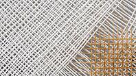 Extreme close-up of a cross-hatched white synthetic tennis racket string bed with one section of natural gut strings visible, full frame texture, even studio lighting, sports equipment, AI generated [IBR125407408]