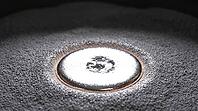 Close-up of a brilliant silver-white molten aluminum weld pool on a bed of fine matte grey aluminum powder, instant of fusion, industrial macro photography, additive manufacturing, AI generated [IBR125407468]