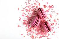 Pink rose french macarons on pastel background traditional dessert in France [IBR125411116]
