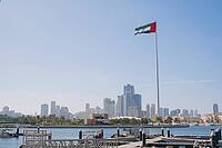 SHARJAH, UAE February 14, 2023: Flag of the United Arab Emirates in Sharjah on the coast [IBR125411124]