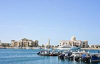 SHARJAH, UAE February 14, 2023: Sharjah port. Sharjah is located on the northern coast of the Persian Gulf on the Arabian Peninsula [IBR125411149]