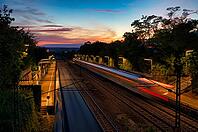 S-Bahn, public transport, train, passes through bus stop, station, platform, summer rain, movement effect, atmospheric, sunset, evening mood, Stuttgart, Baden-Württemberg, Germany [IBR113394886]