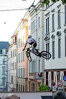 05 September 2026, a mountain biker leaps through the air during the Red Bull Stuttgart Cerro Abajo urban downhill race in Stuttgart, Germany [IBR113394889]