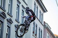 05 September 2026, a mountain biker leaps through the air during the Red Bull Stuttgart Cerro Abajo urban downhill race in Stuttgart, Germany [IBR113394890]