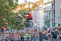 05 September 2026, A rider jumps mid-air during the Red Bull Cerro Abajo urban downhill mountain bike race in Stuttgart, Germany [IBR113394895]