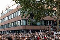 05 September 2026, a mountain bike rider jumps high above spectators at the Red Bull Cerro Abajo urban downhill race in Stuttgart, Germany [IBR113394906]