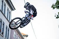 05 September 2026, a mountain biker leaps through the air during the Red Bull Stuttgart Cerro Abajo urban downhill race in Stuttgart, Germany [IBR113394913]