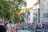 05 September 2026, A rider jumps mid-air during the Red Bull Cerro Abajo urban downhill mountain bike race in Stuttgart, Germany [IBR113394922]