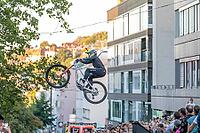 05 September 2026, A rider jumps mid-air during the Red Bull Cerro Abajo urban downhill mountain bike race in Stuttgart, Germany [IBR113394923]