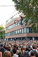 05 September 2026, a mountain bike rider jumps high above spectators at the Red Bull Cerro Abajo urban downhill race in Stuttgart, Germany [IBR113394926]