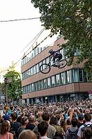05 September 2026, a mountain bike rider jumps high above spectators at the Red Bull Cerro Abajo urban downhill race in Stuttgart, Germany [IBR113394927]