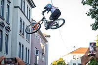 05 September 2026, a mountain biker leaps through the air during the Red Bull Stuttgart Cerro Abajo urban downhill race in Stuttgart, Germany [IBR113394934]