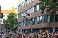 05 September 2026, Mountain bike riders jump over a crowd during the Red Bull Cerro Abajo urban downhill event in Stuttgart, Germany [IBR113394937]