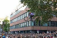 05 September 2026, Mountain bike riders jump over a crowd during the Red Bull Cerro Abajo urban downhill event in Stuttgart, Germany [IBR113394938]