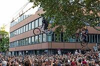 05 September 2026, Mountain bike riders jump over a crowd during the Red Bull Cerro Abajo urban downhill event in Stuttgart, Germany [IBR113394939]