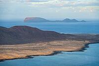 View of sea and the island of La Graciosa and the island of La Alegran, at sunset, Lanzarote, Canary Islands, Spain [IBR125414229]