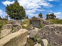 Source of the river Lenne Lennequelle on top of Kahler Asten in the Rothaargebirge with metal plate on it inscription Lennequelle 830 m above sea length of the river 138 km, Winterberg, Sauerland, North Rhine-Westphalia, Germany [IBR125414233]