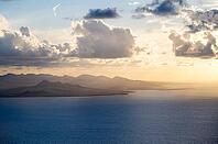 Sea and coast at sunset, Mirador del Porrito viewpoint, Lanzarote, Canary Islands, Spain [IBR125414235]