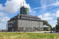 View of the Astenturm complex on the Kahler Asten, situated 841 metres above sea level, featuring a 21-metre-high observation tower, the official weather station of the German Weather Service (DWD) and the main building, comprising a hotel, restaurant and [IBR125414238]