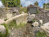 Source of the river Lenne Lennequelle on top of Kahler Asten in the Rothaargebirge with metal plate on it inscription Lennequelle 830 m above sea length of the river 138 km, Winterberg, Sauerland, North Rhine-Westphalia, Germany [IBR125414278]