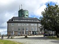 View of the Astenturm complex on the Kahler Asten, situated 841 metres above sea level, featuring a 21-metre-high observation tower, the official weather station of the German Weather Service (DWD) and the main building, comprising a hotel, restaurant and [IBR125414283]