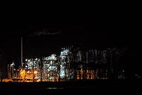 A photo of a factory at night, Lodi, Italy [IBR125415360]