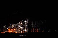 A photo of a factory at night, Lodi, Italy [IBR125415367]