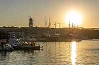 Sunrise over the port of Krk, old town of Krk, island of Krk, Croatia [IBR125415373]