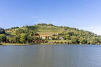 View over Lake Sulmsee to the Silberberg wine region, Sulmsee, Styria, Austria [IBR125415378]