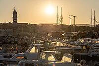 Sunrise over the port of Krk, old town of Krk, island of Krk, Croatia [IBR125415395]