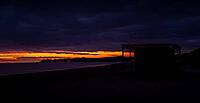 A photo of the sunset on the beautiful beach of Posada, Sardinia [IBR125415396]