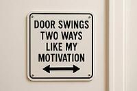 Funny demotivational poster fixed on a white door, comparing a swinging door to fluctuating motivation, AI generated [IBR125421188]