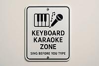 Sign promoting singing and fun in a designated keyboard karaoke zone, encouraging vocal expression before engaging in typing work, AI generated [IBR125421230]
