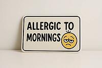 Funny sign expressing allergy to mornings with a grumpy emoji, perfect for representing morning mood, AI generated [IBR125421241]
