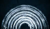 Abstract fan-shaped grey blue concentric wave pattern representing echocardiogram ultrasound imaging, dark background, cardiac monitoring concept, clinical macro photography, AI generated [IBR125421272]