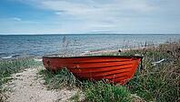 Red boat on the Baltic Sea, municipality of Sonderborg, Syddanmark region, Denmark [IBR125423480]