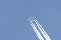 Airbus A380 jet commercial passenger aircraft of Emirates airline flying in a blue sky with contrails or vapour trails behind in the atmosphere, England, United Kingdom [IBR125423515]
