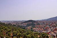 Aerial view of beautiful city Barcelona in sunny summer weather [IBR125436248]