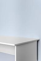 Minimal white desk against light blue wall. Cleaning interior background with copy space for product display, mockup or advertising design [IBR125462110]