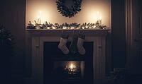 Minimalist mantel with a single silver garland and white stockings, AI generated [IBR125472318]