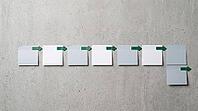 Row of blank sticky notes on grey concrete wall, green arrow markers all pointing right, alignment and clear plan concept, copy space, AI generated [IBR125472321]