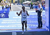 27 September 2026, Athletics: BMW Berlin Marathon 2026, from left: Gemechu Dida Diriba (ETH) finishes second, exhausted, at the 2026 BMW BERLIN MARATHON [IBR113453119]